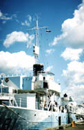 View of mast and lantern from pier